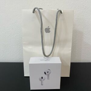 Apple AirPods Earbuds - Sleek White Design